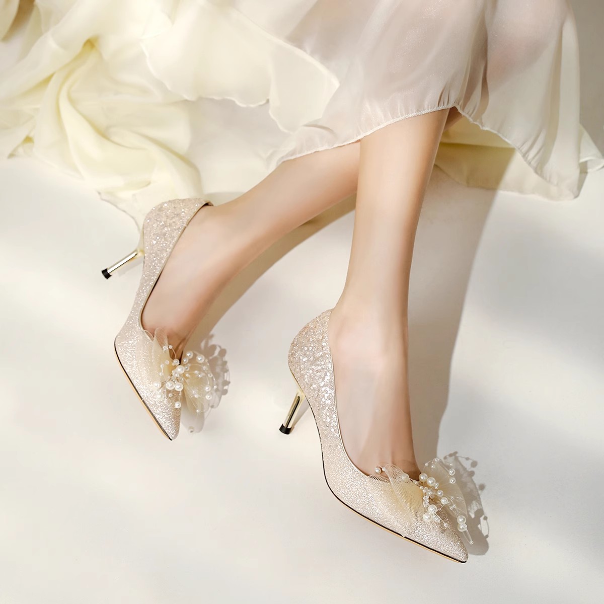 一代佳人2024春季新款蝴蝶结高跟鞋女细跟新娘婚鞋亮片水晶伴娘鞋